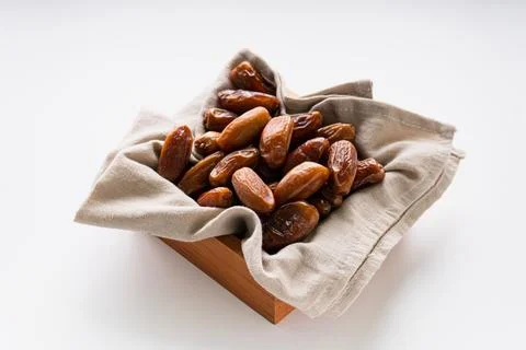 Fresh dried dates fruit on white isolated background. Stock Photos