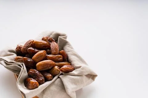 Fresh dried dates fruit on white isolated background. Stock Photos
