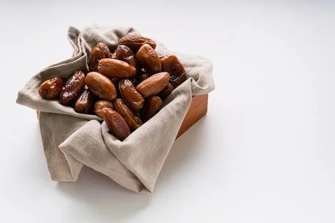Fresh dried dates fruit on white isolated background. Stock Photos