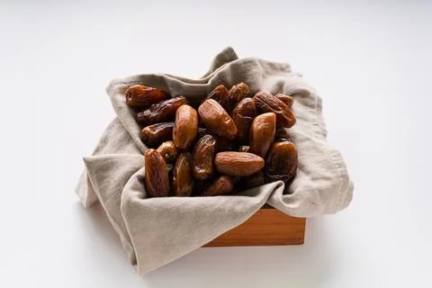 Fresh dried dates fruit on white isolated background. Stock Photos