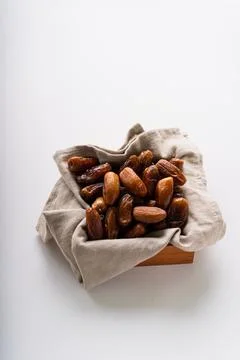 Fresh dried dates fruit on white isolated background. Stock Photos