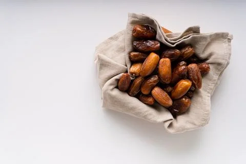 Fresh dried dates fruit on white isolated background. Stock Photos