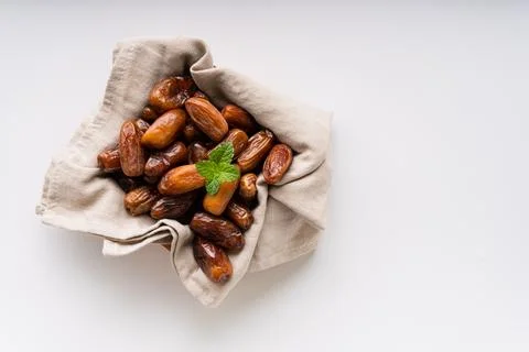 Fresh dried dates fruit on white isolated background. Stock Photos