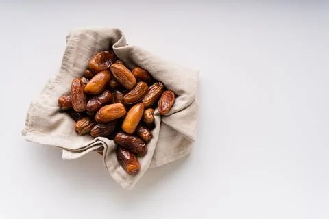 Fresh dried dates fruit on white isolated background. Stock Photos
