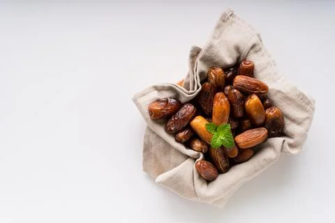 Fresh dried dates fruit on white isolated background. Stock Photos