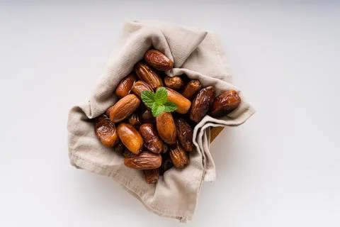 Fresh dried dates fruit on white isolated background. Stock Photos