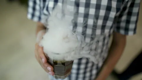 Fresh Drink With Dry Ice Clouds Of Smoke Stock Footage 304875440