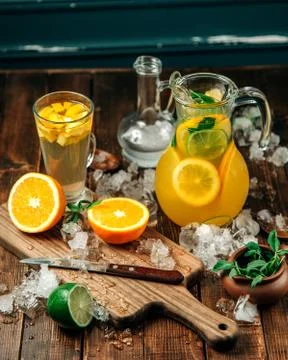Fresh drinks with lots of ice on table Stock Photos