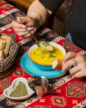 Fresh dushbere with bread on the table Stock Photos