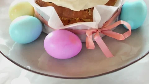 Fresh Easter cakes with sugar icing and Easter eggs in light pastel colors Stock Footage 300290076