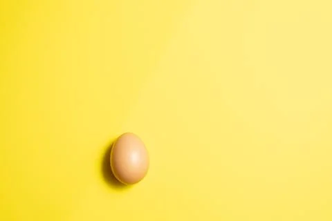 Fresh Easter Egg on a Yellow Background. Happy Easter Stock Photos