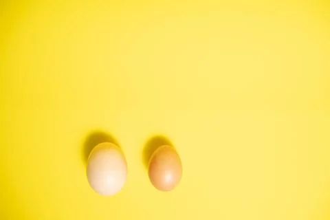 Fresh Easter Eggs on a Yellow Background. Happy Easter Stock Photos
