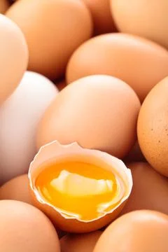 Fresh eggs background. Stock Photos