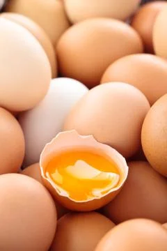 Fresh eggs background. Stock Photos
