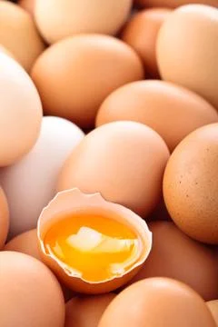 Fresh eggs background. Stock Photos
