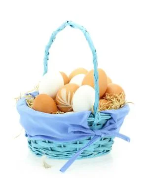 Fresh eggs in the basket Stock Photos