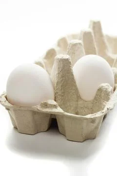 Fresh eggs in box Stock Photos