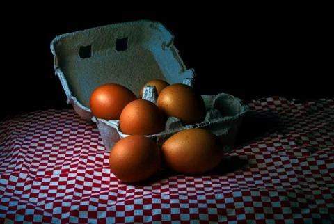 Fresh eggs on box Photos
