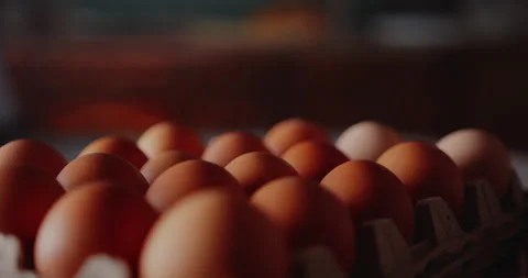 Fresh Eggs on tabe Close up Stock Footage 168364527