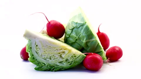 Fresh farm vegetables with cabbage and radishes composition Video stock 335523801