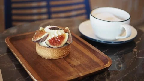 Fresh Fig Tart Served With A Cup Of Coffee Stock Footage 345952988