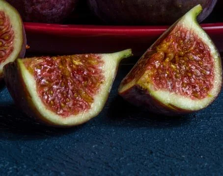 Fresh figs close-up on black background Stock Photos