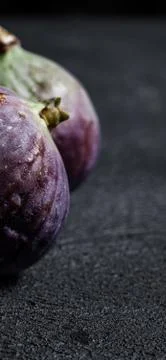 Fresh figs close-up on black background Stock Photos