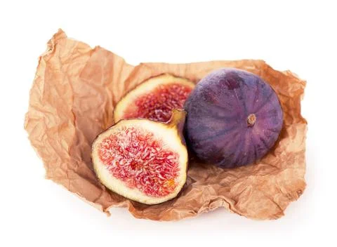 Fresh figs. Fruit with half and quarter isolated on white background. With cl Stock Photos