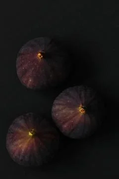 Fresh figs isolated on black Stock Photos