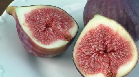 Fresh figs on a white plate Stock Footage 56646498