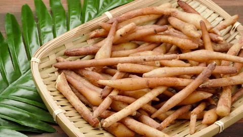 Fresh Finger root or kaempfer Thai herb on wooden table background. 4k footage Stock Footage 158172237