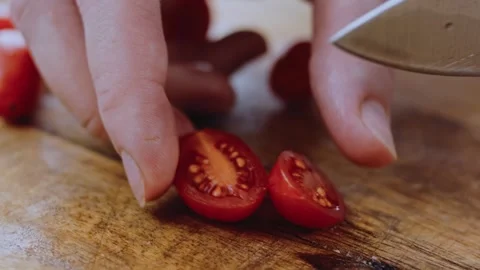 Fresh finished meal angle: adding walnuts and spices to the sauce Stock Footage 342200963
