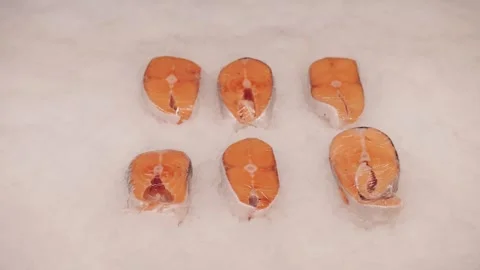 Fresh fish steaks on ice. Stock Footage 327855829