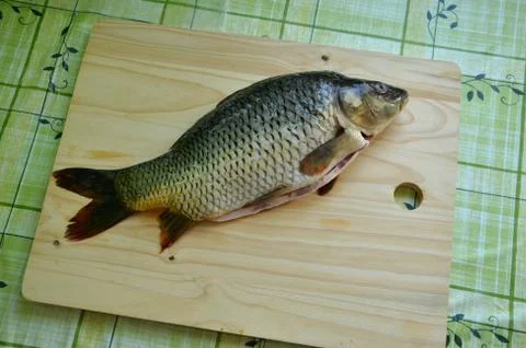 Fresh fish on the table Stock Photos