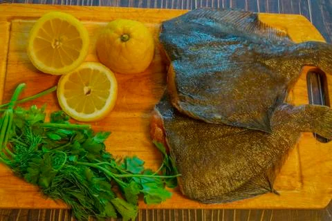Fresh fish without the head with caviar. Stock Photos