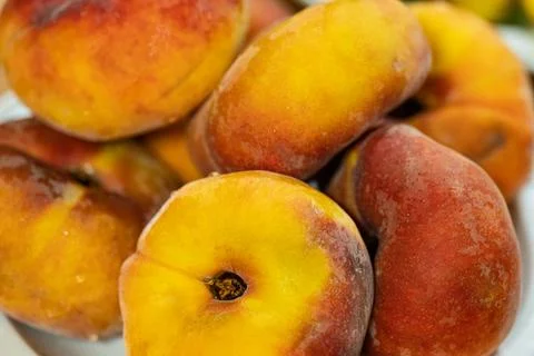 Fresh flat donut peaches macro close up Stock Photos