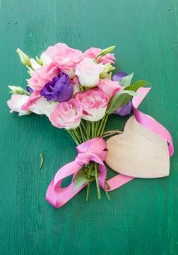 Fresh flowers on rustic background Stock Photos