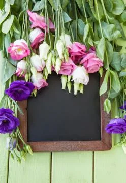 Fresh flowers on rustic background Stock Photos