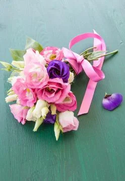 Fresh flowers on rustic background Stock Photos