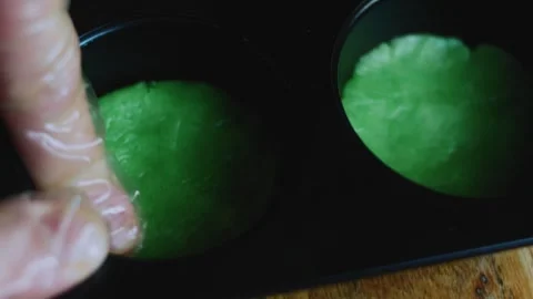 Fresh food sequence of rolling colored dough into small balls Stock Footage 342155120