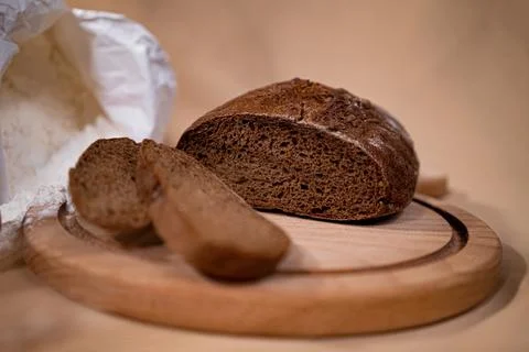 Fresh fragrant bread on rustic Stock Photos