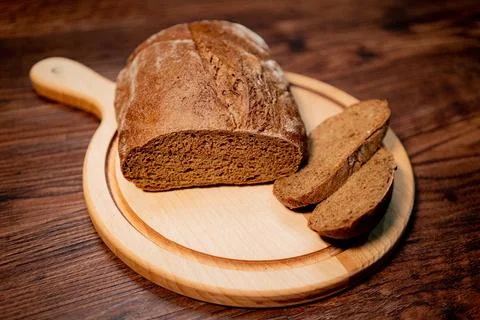 Fresh fragrant bread on rustic Stock Photos