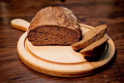 Fresh fragrant bread on rustic Stock Photos