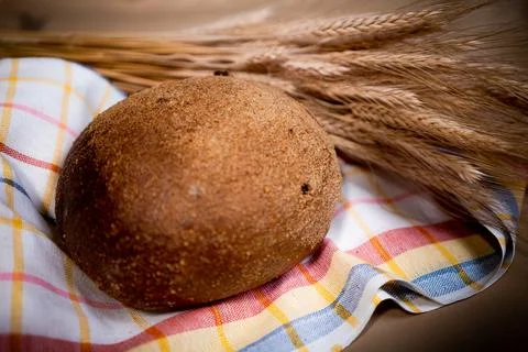 Fresh fragrant bread on rustic Stock Photos