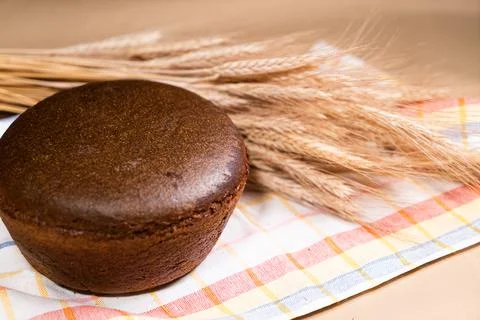Fresh fragrant bread on rustic Stock Photos