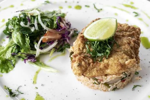 Fresh fried battered cod fish fillet summer light lunch meal Stock Photos