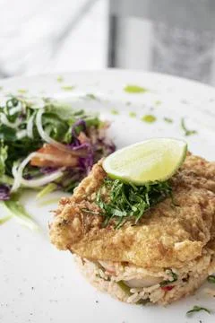 Fresh fried battered cod fish fillet summer light lunch meal Stock Photos