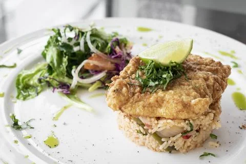 Fresh fried battered cod fish fillet summer light lunch meal Stock Photos
