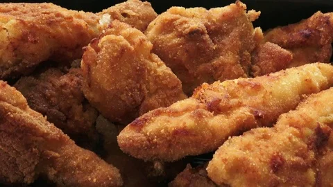 Fresh fried chicken on a pan. Fried chicken. Stock-Footage 79308932