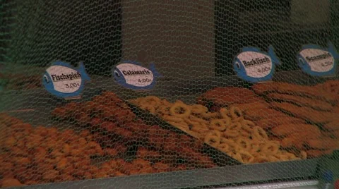Fresh fried fish at stall in German City, Germany Видео 7736062